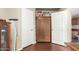 Hallway with linen closet and doors at 13137 W Wilshire Dr, Goodyear, AZ 85395