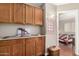 Spacious kitchen with wood cabinets at 13137 W Wilshire Dr, Goodyear, AZ 85395
