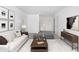 Staged living room with modern decor and neutral tones at 13282 E Verbina Ln, Florence, AZ 85132