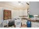 Modest kitchen with white appliances, including a gas stove and a view into the dining area at 1438 S 112Th Ave, Avondale, AZ 85323