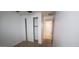 Bright bedroom with carpet flooring and a closet with sliding doors offering great storage at 15424 N 22Nd Ln, Phoenix, AZ 85023