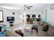 Comfortable living room showcases a large sectional sofa, open floor plan, and seamless flow to other living areas at 15424 N 22Nd Ln, Phoenix, AZ 85023