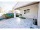 Spacious covered patio featuring stone tile flooring and a built-in outdoor grill, perfect for entertaining at 15424 N 22Nd Ln, Phoenix, AZ 85023