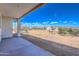 Covered patio overlooking a desert landscape with mountain views at 16025 E Rancho Laredo Dr, Scottsdale, AZ 85262
