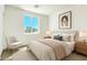 Bright bedroom with a desert view, neutral tones, and comfortable seating area at 16025 E Rancho Laredo Dr, Scottsdale, AZ 85262