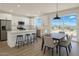 Well-equipped open kitchen with a large island, modern appliances, and sleek countertops at 16025 E Rancho Laredo Dr, Scottsdale, AZ 85262