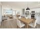 Open concept living room and kitchen featuring modern decor and lots of natural light at 16025 E Rancho Laredo Dr, Scottsdale, AZ 85262