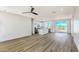 Spacious living room with modern kitchen, island, stainless appliances and scenic mountain views at 16025 E Rancho Laredo Dr, Scottsdale, AZ 85262