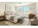 Well-lit main bedroom with large windows, stylish furniture, and modern decor at 16025 E Rancho Laredo Dr, Scottsdale, AZ 85262