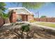 Charming brick home with manicured lawn, sidewalk, and lovely exterior at 1650 N 10Th St, Phoenix, AZ 85006