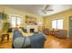 Comfortable living room with natural light, ceiling fan, and hardwood floors at 1650 N 10Th St, Phoenix, AZ 85006