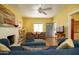 Comfortable living room with natural light, ceiling fan, and hardwood floors at 1650 N 10Th St, Phoenix, AZ 85006