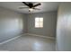 Bedroom featuring a ceiling fan and bright window, offering natural light at 1720 W Michigan Ave, Phoenix, AZ 85023