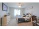 Cozy bedroom with a four-poster bed, soft lighting, and comfortable decor at 19365 N Pietra Dr, Maricopa, AZ 85138