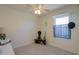 Spare bedroom with a ceiling fan and natural light at 19365 N Pietra Dr, Maricopa, AZ 85138