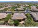 Aerial view of a landscaped home with a backyard patio and desert landscaping at 1958 W Legends Way, Anthem, AZ 85086
