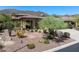 Beautiful single-story home featuring desert landscaping with mountain views at 1958 W Legends Way, Anthem, AZ 85086