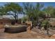Enjoy outdoor living with a built in BBQ, pizza oven, and seating area at 1958 W Legends Way, Anthem, AZ 85086
