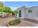 Backyard with an outdoor covered patio and several landscaped areas at 2018 E Balboa Dr, Tempe, AZ 85282