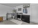 Laundry area equipped with washer, dryer, shelving and storage at 2018 E Balboa Dr, Tempe, AZ 85282