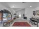 Open living room featuring high ceilings, fireplace and large archway windows at 2018 E Balboa Dr, Tempe, AZ 85282