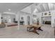 Spacious living room with modern floors, exposed beams and ample natural light at 2018 E Balboa Dr, Tempe, AZ 85282