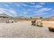 Expansive backyard with brick pavers, barbecue area, and ample space for entertaining Gathering and friends at 203 S 190Th Ave, Buckeye, AZ 85326