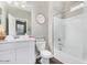 Clean bathroom with white vanity, shower-tub combo with white tile, and modern fixtures at 203 S 190Th Ave, Buckeye, AZ 85326