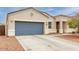 Charming single-story home featuring a two-car garage, neutral stucco and xeriscaping for low maintenance at 203 S 190Th Ave, Buckeye, AZ 85326