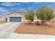 Attractive single-story home with a two-car garage and desert landscaping for easy care at 203 S 190Th Ave, Buckeye, AZ 85326