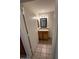 Well-lit bathroom featuring granite countertops, wooden cabinetry, and decorative vanity lighting at 21192 N 80Th Ln, Peoria, AZ 85382