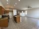 Inviting living area showcases tile flooring, a kitchen view, and ample space for gatherings at 21192 N 80Th Ln, Peoria, AZ 85382