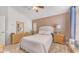 Spacious bedroom with brown walls, light colored carpet, and natural lighting at 2150 W Alameda Rd # 1424, Phoenix, AZ 85085