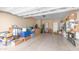 Spacious garage interior with ample storage space and a clean, well-maintained concrete floor, providing parking at 2150 W Alameda Rd # 1424, Phoenix, AZ 85085