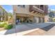 Townhouse with open garage reveals an interior, next to manicured green space, adding charm at 2150 W Alameda Rd # 1424, Phoenix, AZ 85085