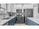 Modern kitchen showcasing white cabinets, granite countertops, and stainless-steel appliances at 2150 W Alameda Rd # 1424, Phoenix, AZ 85085