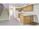 Basement area with kitchenette, stairs, and ample potential for customization at 225 S Pioneer -- # 36, Mesa, AZ 85204