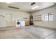 Spacious garage with laundry machines and water heater at 225 S Pioneer -- # 36, Mesa, AZ 85204