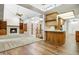 Bright, open living space with fireplace, wood floors, vaulted ceilings and staircase at 225 S Pioneer -- # 36, Mesa, AZ 85204