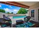 Relaxing outdoor patio area featuring a private pool, lounge chairs and seating at 225 S Pioneer -- # 36, Mesa, AZ 85204