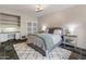 Comfortable bedroom with built-in shelving provides ample storage at 23240 N Country Club Trl, Scottsdale, AZ 85255