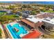 Clubhouse aerial with a large pool, seating areas and expansive parking lot at 23240 N Country Club Trl, Scottsdale, AZ 85255