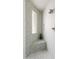 Glass shower with mosaic tile and a built-in bench offers a spa-like experience at 23240 N Country Club Trl, Scottsdale, AZ 85255