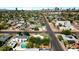 Aerial view of a quiet residential neighborhood with mature trees, showcasing proximity to city amenities and green spaces at 2545 N 14Th St, Phoenix, AZ 85006