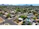 An aerial view shows a home with a backyard pool nestled in a charming, well-established neighborhood at 2545 N 14Th St, Phoenix, AZ 85006