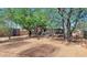 The spacious backyard offers ample shade from mature trees, creating a serene and private outdoor retreat at 2545 N 14Th St, Phoenix, AZ 85006