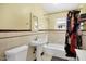 Classic bathroom with a pedestal sink, tile details, and a shower-tub combination at 2545 N 14Th St, Phoenix, AZ 85006