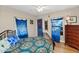Eclectic bedroom with blue accents and unique door decor at 2545 N 14Th St, Phoenix, AZ 85006