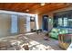 Enjoy the spacious covered patio with painted brick, unique design elements, and rustic charm, a perfect spot for relaxing outdoors at 2545 N 14Th St, Phoenix, AZ 85006