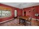 Bright dining area featuring large windows, and a door to a backyard patio at 2545 N 14Th St, Phoenix, AZ 85006